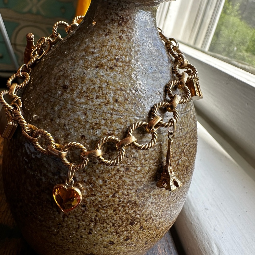 Solid 14k gold Paris themed charm bracelet